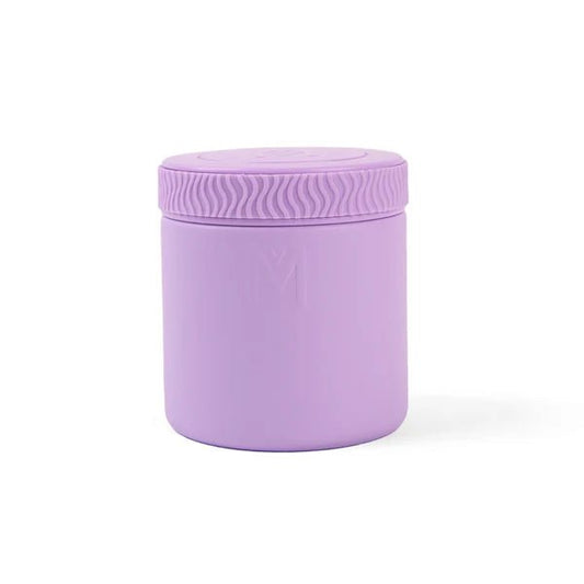 A light purple silicone jar with a matching screw-on lid, featuring a wavy textured pattern on the lid and a subtle embossed 'M' logo on the front, set against a plain white background.